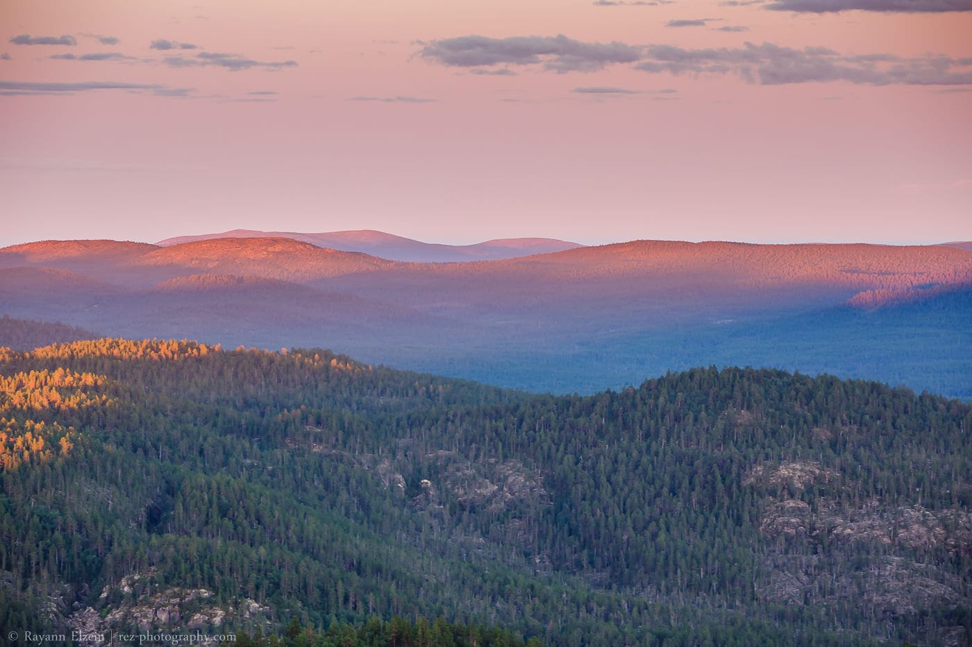 The fells of the Inari regions lit up by the warm light of the Lapland Midnight Sun