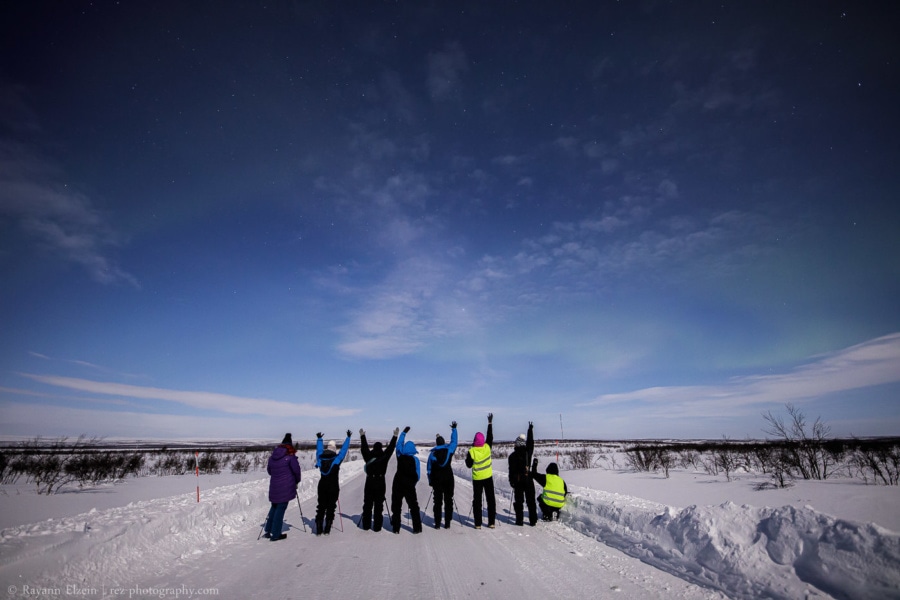 northern lights photography workshop participants under very faint northern lights