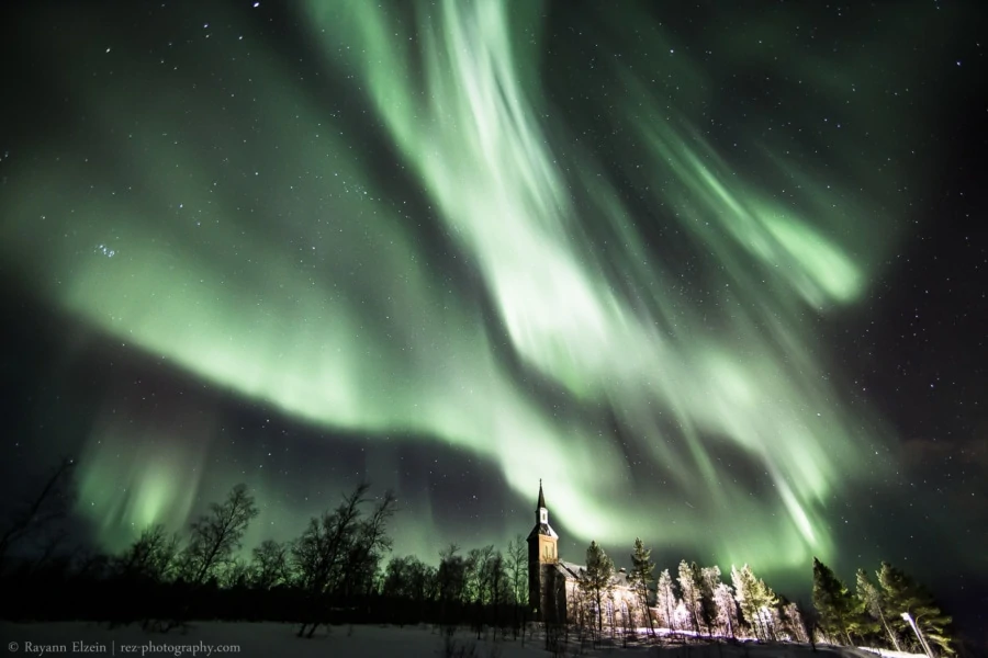 Aurora photo above the church of Utsjoki in Finnish Lapland
